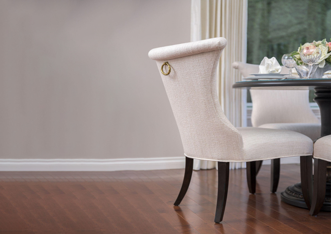 White dining chair with fresh fabric and cushioning – Dining Chair Upholstery service in Dubai