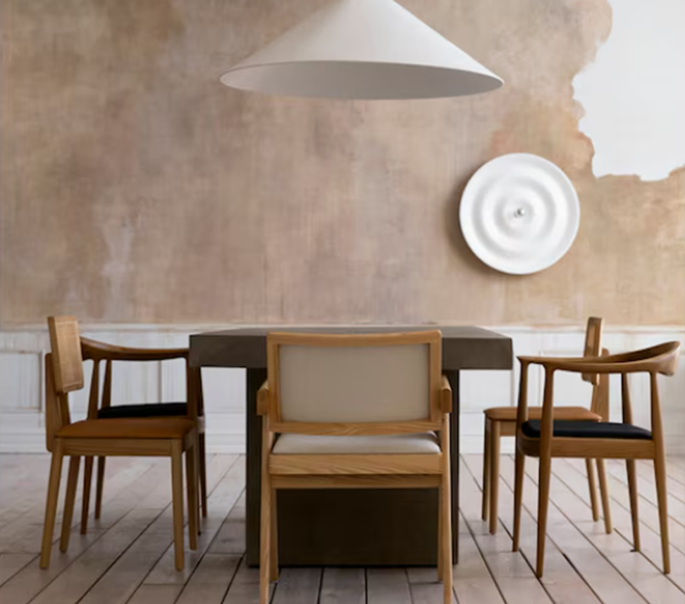 Custom made wooden dining table set with matching chairs.