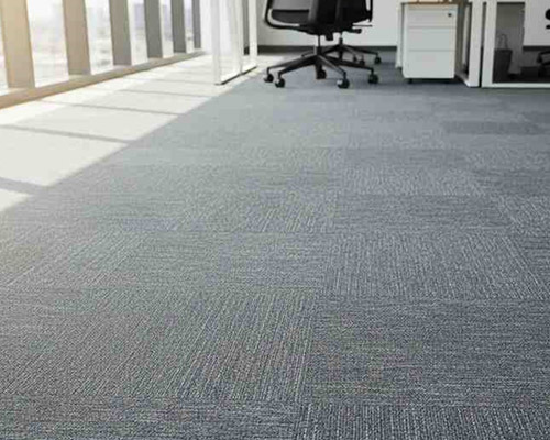 Loop pile carpet tiles installed in modern office space with durable textured finish.