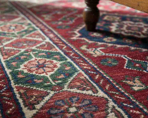 Wool carpet with traditional patterned design and rich, durable natural fibers