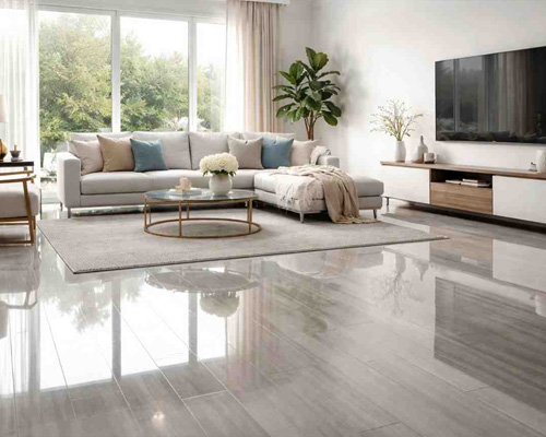 Bright living room with high gloss laminate flooring reflecting natural light and modern furniture