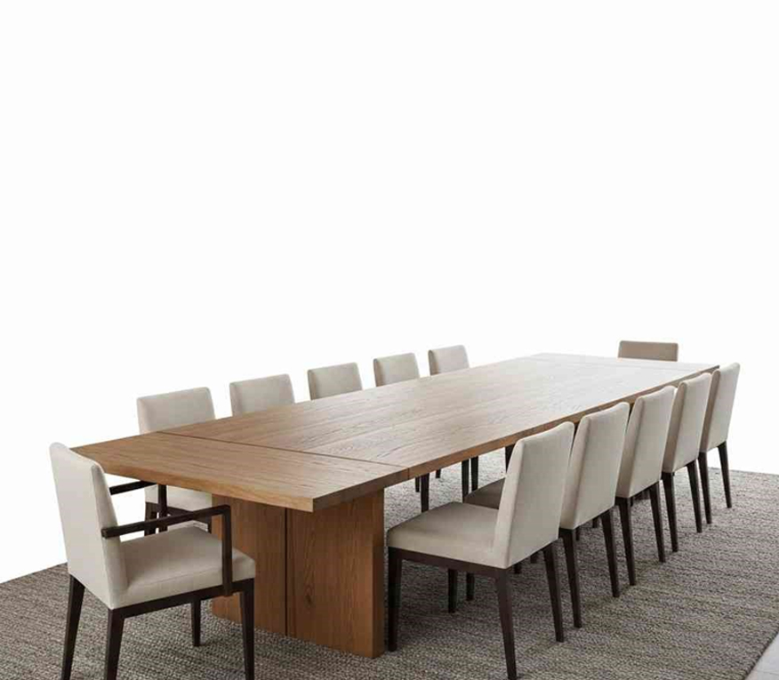 Extendable custom dining table with multiple chairs for large dining space