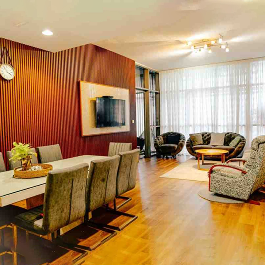 Elegant custom made sofa seating arrangement in modern living room interior