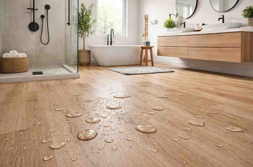 Waterproof LVT flooring installed in modern bathroom interior