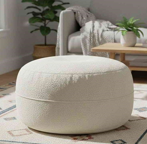 Custom made pouf ottoman with soft cushioned fabric for cozy living room seating