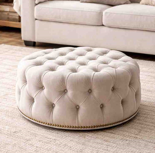 Custom made tufted ottoman with button detailing for a luxurious living room look