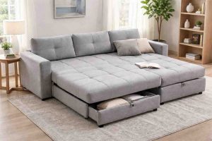 Light grey custom made sofa bed with pull-out storage drawers in a modern living room