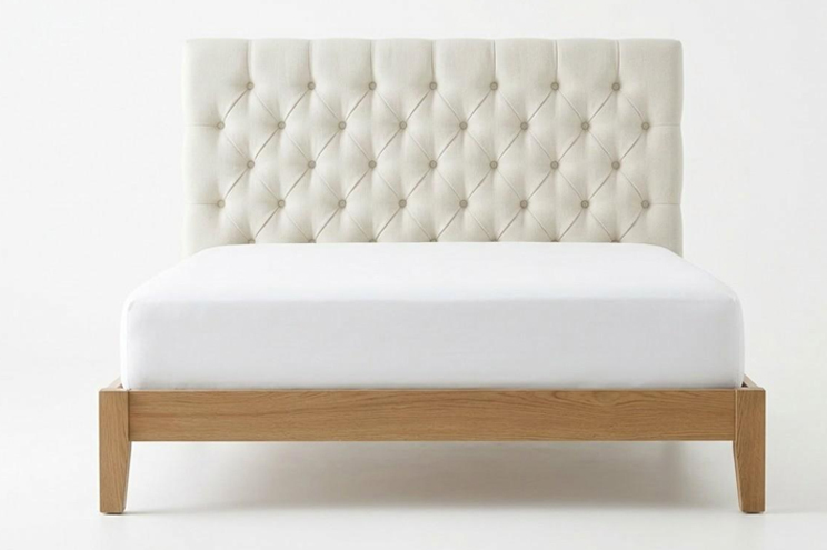 Custom upholstered headboard bed with tufted design and wooden frame