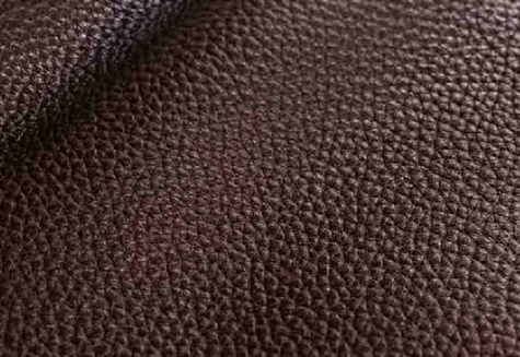 Full-grain leather texture with natural durable surface