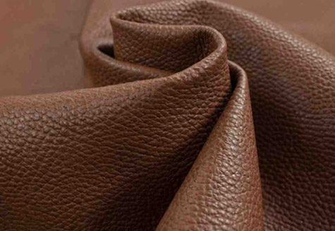 Top-grain leather upholstery with smooth refined finish