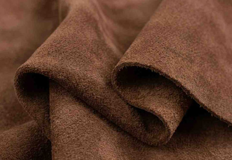 Suede leather upholstery with soft matte texture