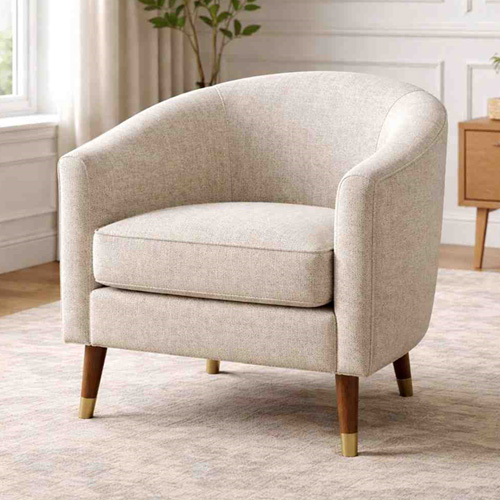 Barrel armchair with curved back and soft fabric upholstery