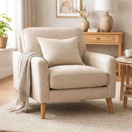 Linen upholstered armchair with lightweight natural texture