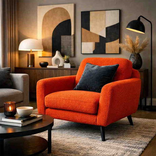 Accent armchair in living room with bold upholstery and modern design